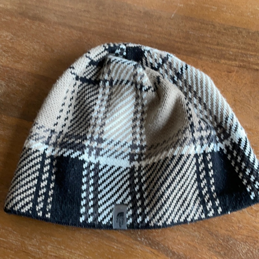 Woman’s plaid North Face winter hat